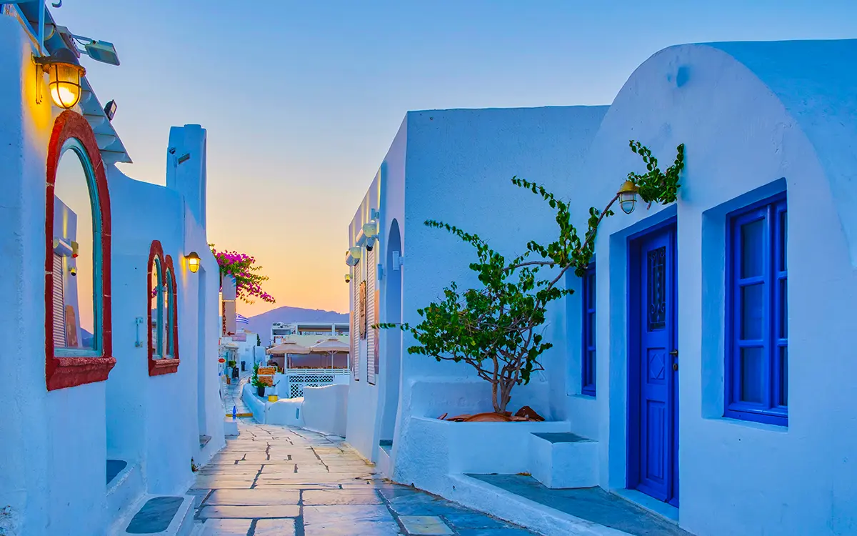 Sunset at the Greek village of Oia Santorini Greece with a view over the ocean caldera of Santorini