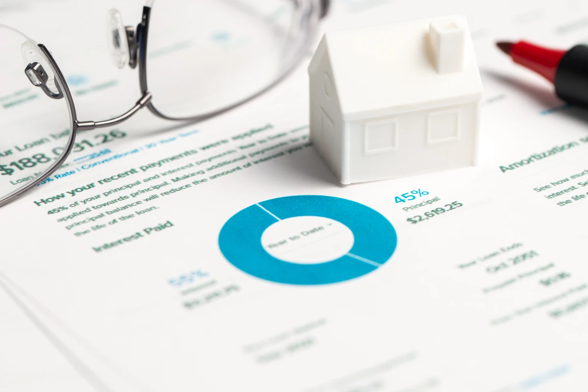 Loan statement with white house model
